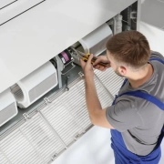 MWM-HVAC Technician working on an air conditioning system